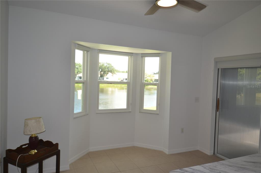 4020 Casa Del Sol Way New Port Richey, FL 34655 - Photo 30 of 98 a bedroom with a window