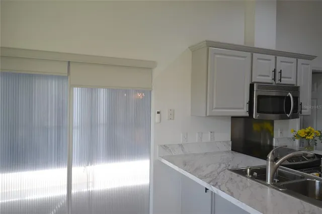 a stove top oven sitting on a counter top space