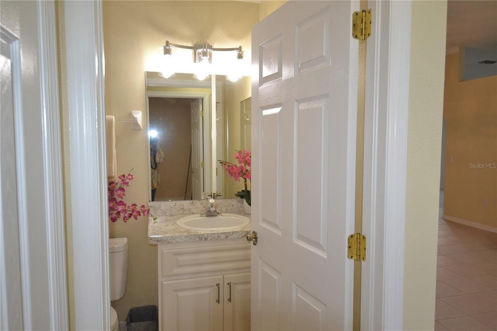 4020 Casa Del Sol Way New Port Richey, FL 34655 - Photo 42 of 98 a bathroom with a sink vanity and a mirror