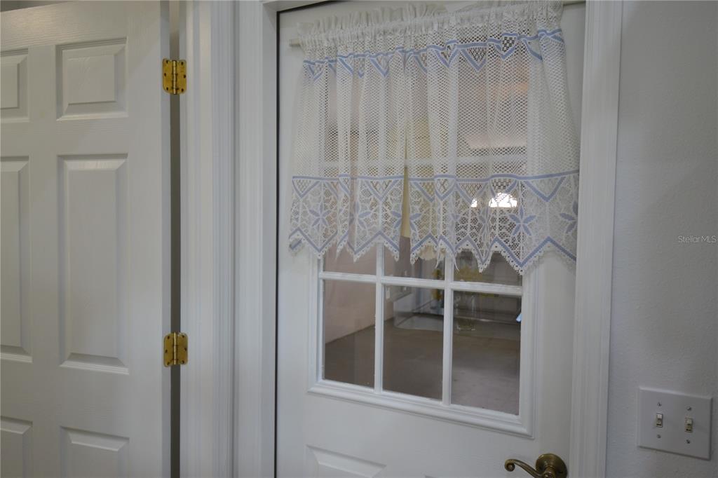 4020 Casa Del Sol Way New Port Richey, FL 34655 - Photo 70 of 98 a view of a glass door with a glass door