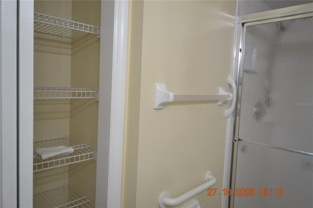 4020 Casa Del Sol Way New Port Richey, FL 34655 - Photo 95 of 98 a bathroom with a glass shower door