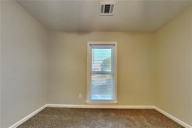 a view of empty room with window