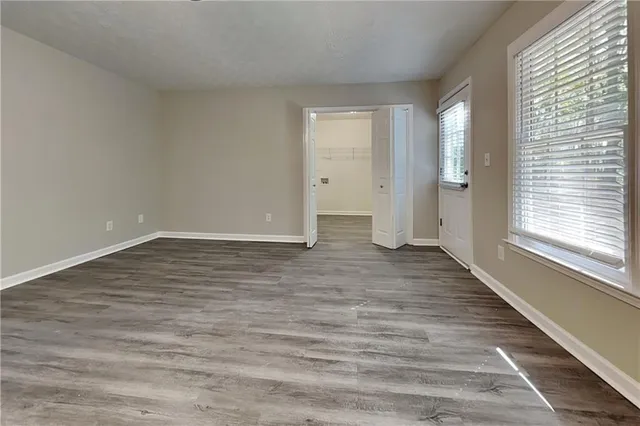 a view of an empty room and window