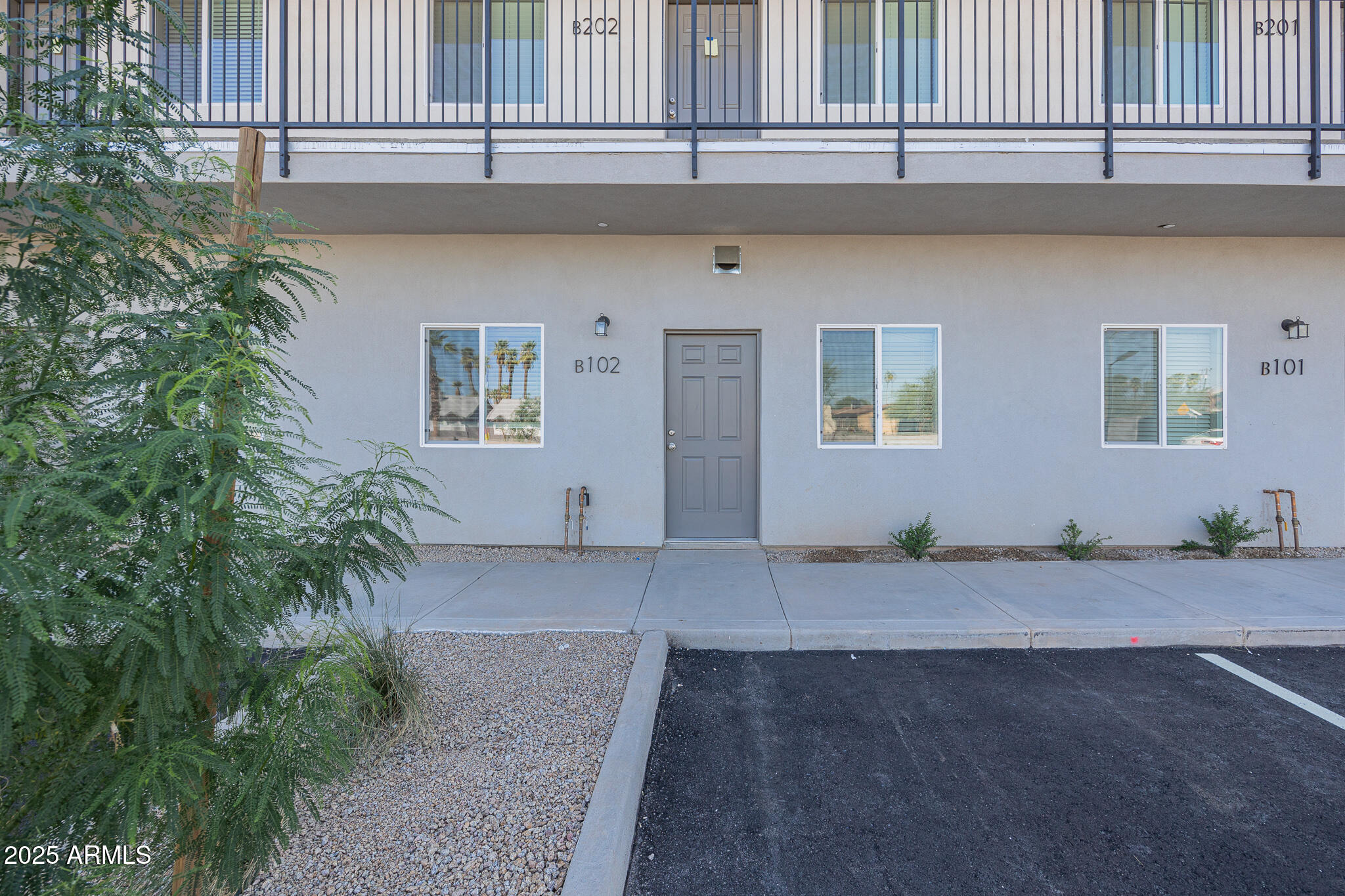 2121 West Adams Street, Unit B102 Phoenix, AZ 85009 - Photo 2 of 25 a view of outdoor space and yard