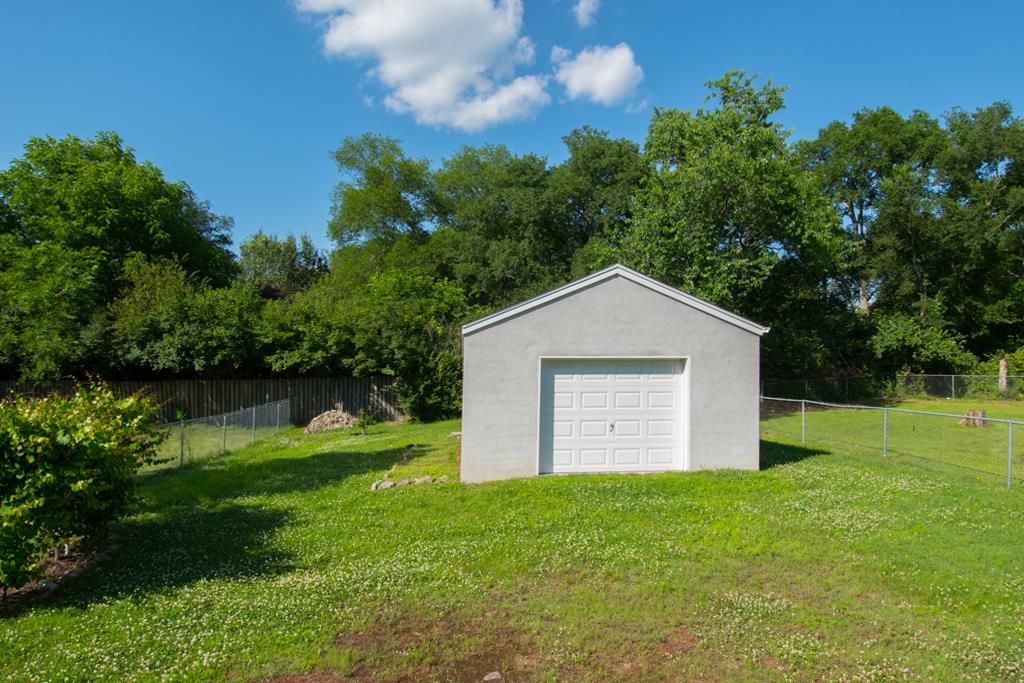 583 Neelys Bend Road Madison, TN 37115 - Photo 23 of 23 The detached garage is extra large at 18x24 feet. You can fit two vehicles or any number of other things! The back yard is also fully fenced.