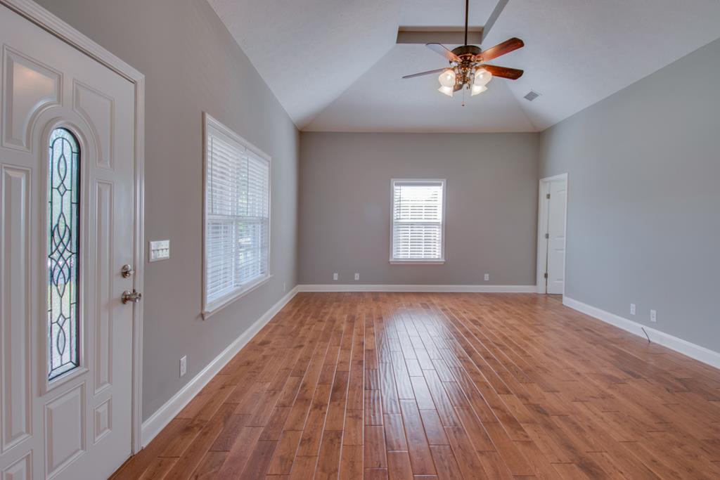 583 Neelys Bend Road Madison, TN 37115 - Photo 8 of 23 As you walk into the home, you are greeted with an extra large living room with high tray ceilings.