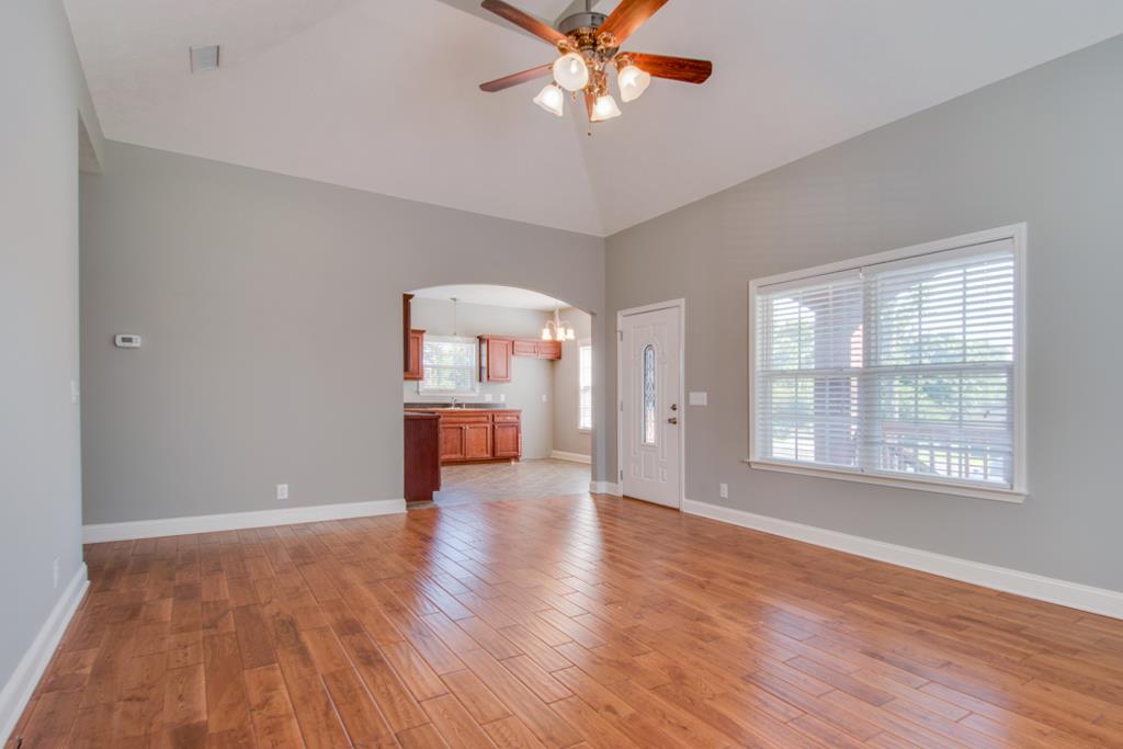 583 Neelys Bend Road Madison, TN 37115 - Photo 10 of 23 A beautiful archway connects the living room and kitchen as the center of the home.