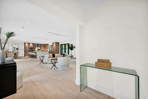 a bedroom with a large bed and a couch