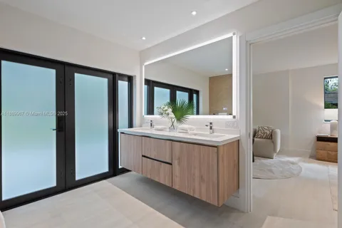 a bathroom with a bathtub and shower
