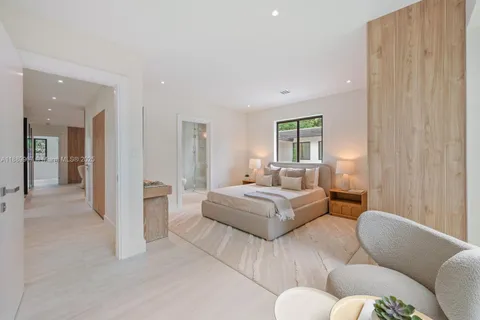 a bathroom with a toilet sink and shower