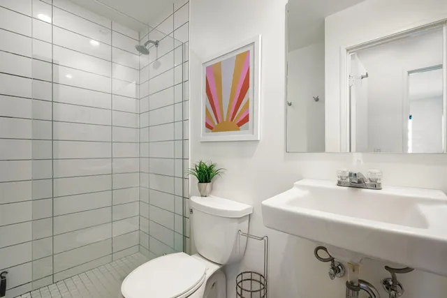 a view of a swimming pool with a lounge chairs