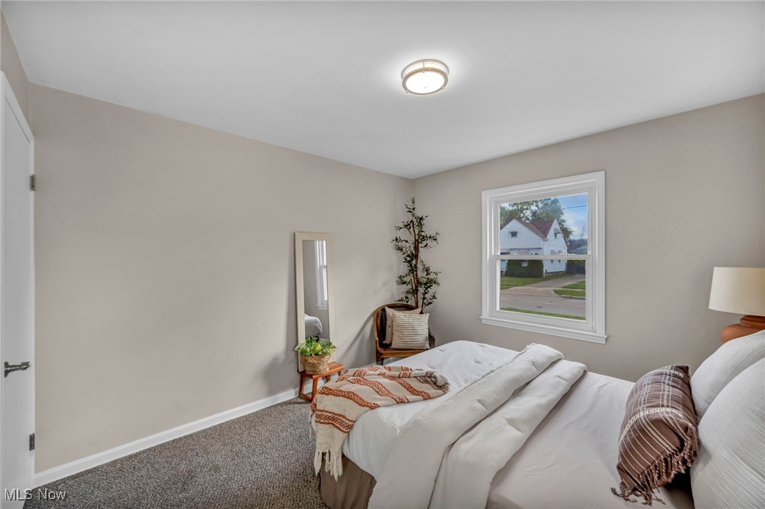 1560 Douglas Road Wickliffe, OH 44092 - Photo 20 of 39 Carpeted bedroom featuring baseboards