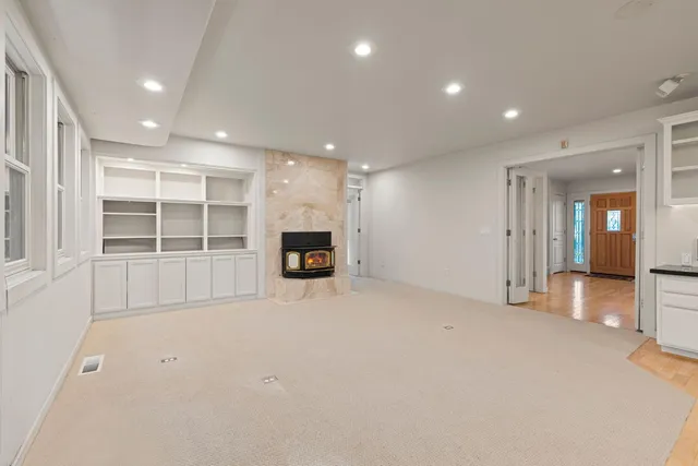 a kitchen with a sink stove and microwave