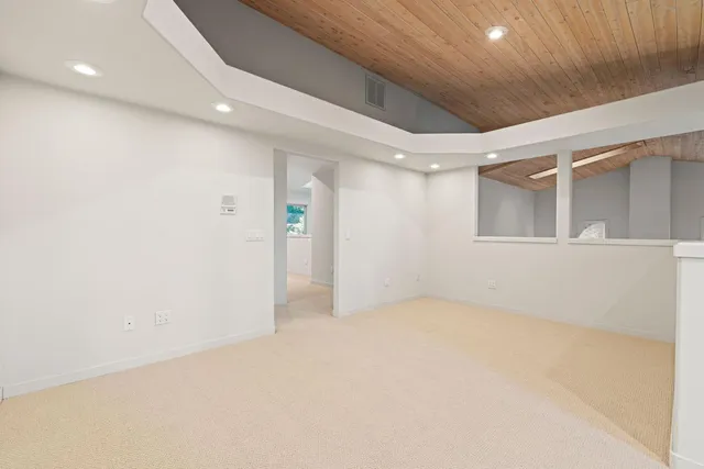 a bathroom with a shower and a sink