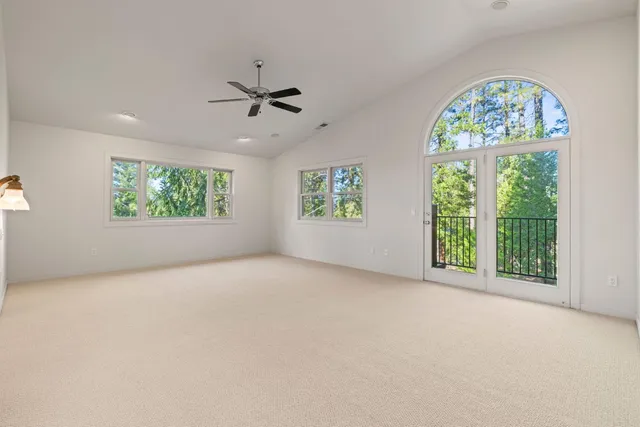 a kitchen with sink cabinets and window