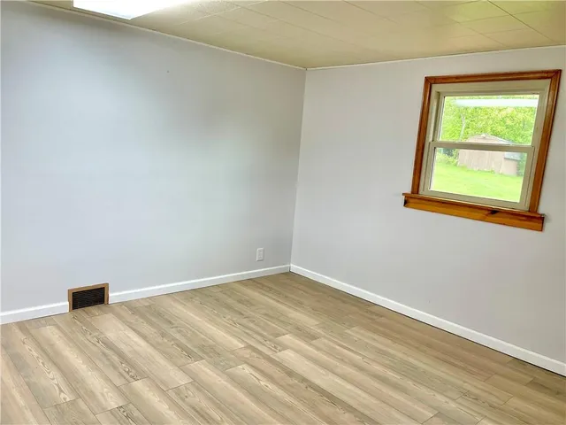 an empty room with a window
