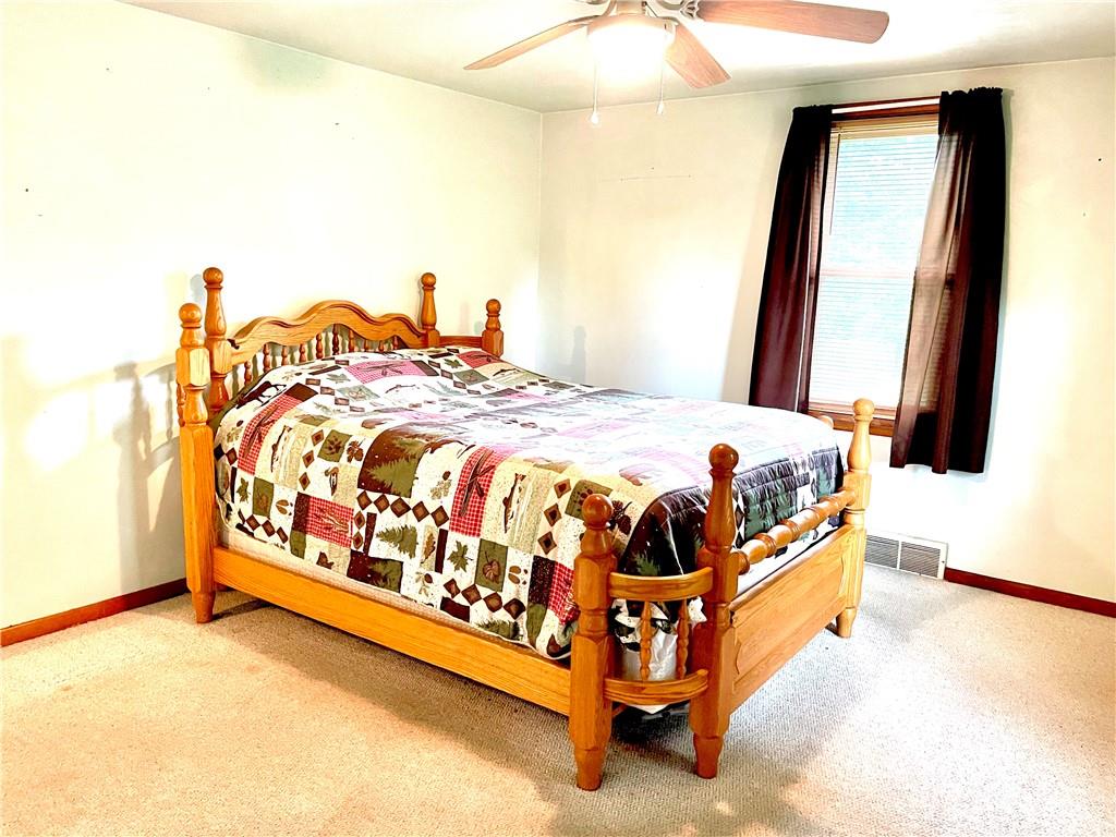 1339 Freeport Road Kittanning, PA 16201 - Photo 15 of 25 a bedroom with a bed and a mirror