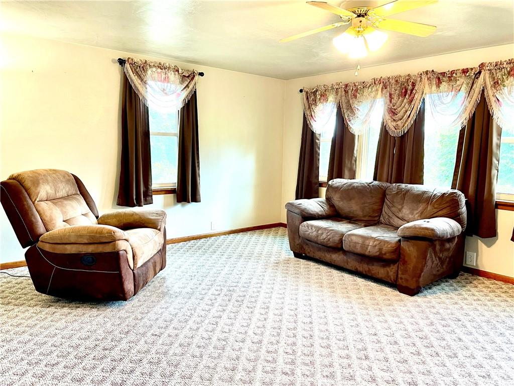 1339 Freeport Road Kittanning, PA 16201 - Photo 16 of 25 a living room with a couch and a window