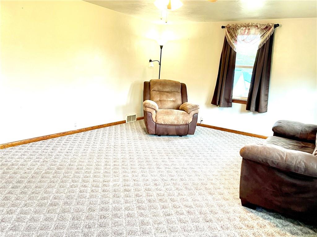 1339 Freeport Road Kittanning, PA 16201 - Photo 18 of 25 a living room with furniture and a window