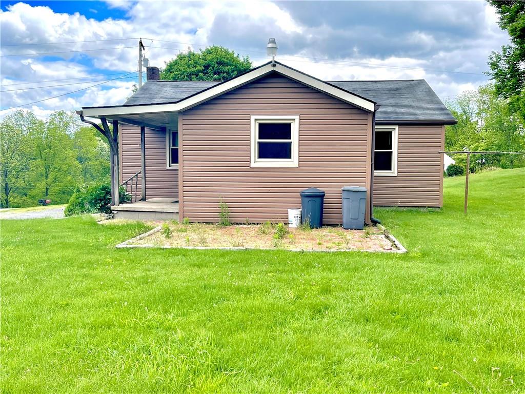 1339 Freeport Road Kittanning, PA 16201 - Photo 4 of 25 a front view of house with yard and green space