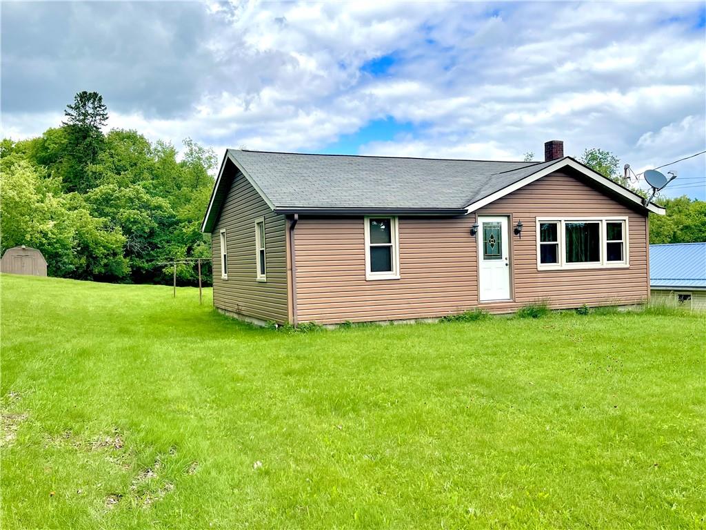 1339 Freeport Road Kittanning, PA 16201 - Photo 6 of 25 a view of a backyard with plants and a garden