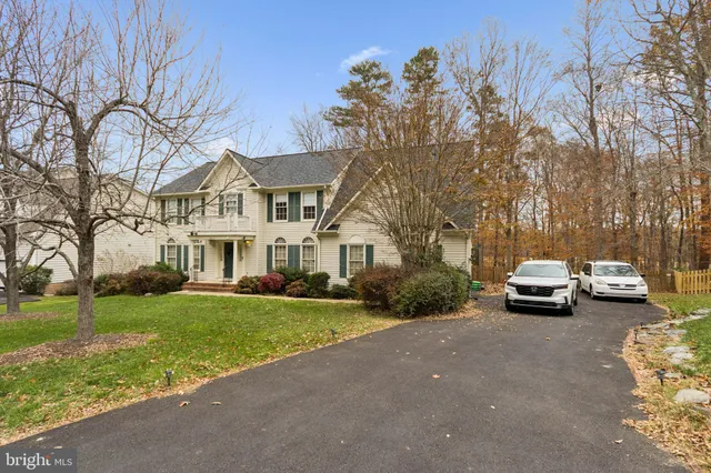a view of a street with a parked cars