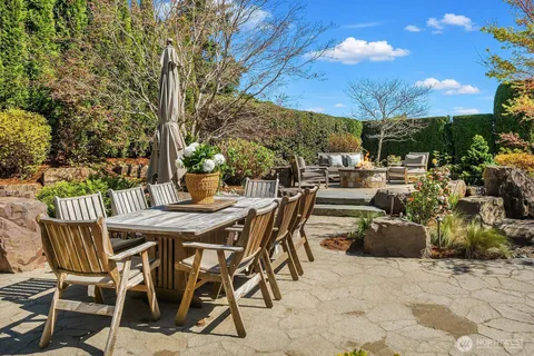 a view of an outdoor space with a table and chair