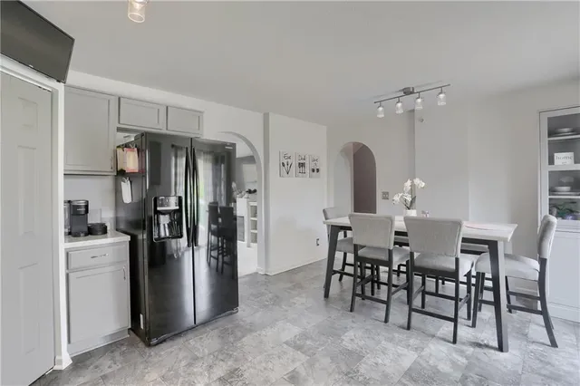 a view of a dining room with furniture
