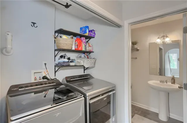 a kitchen with a stove and a sink