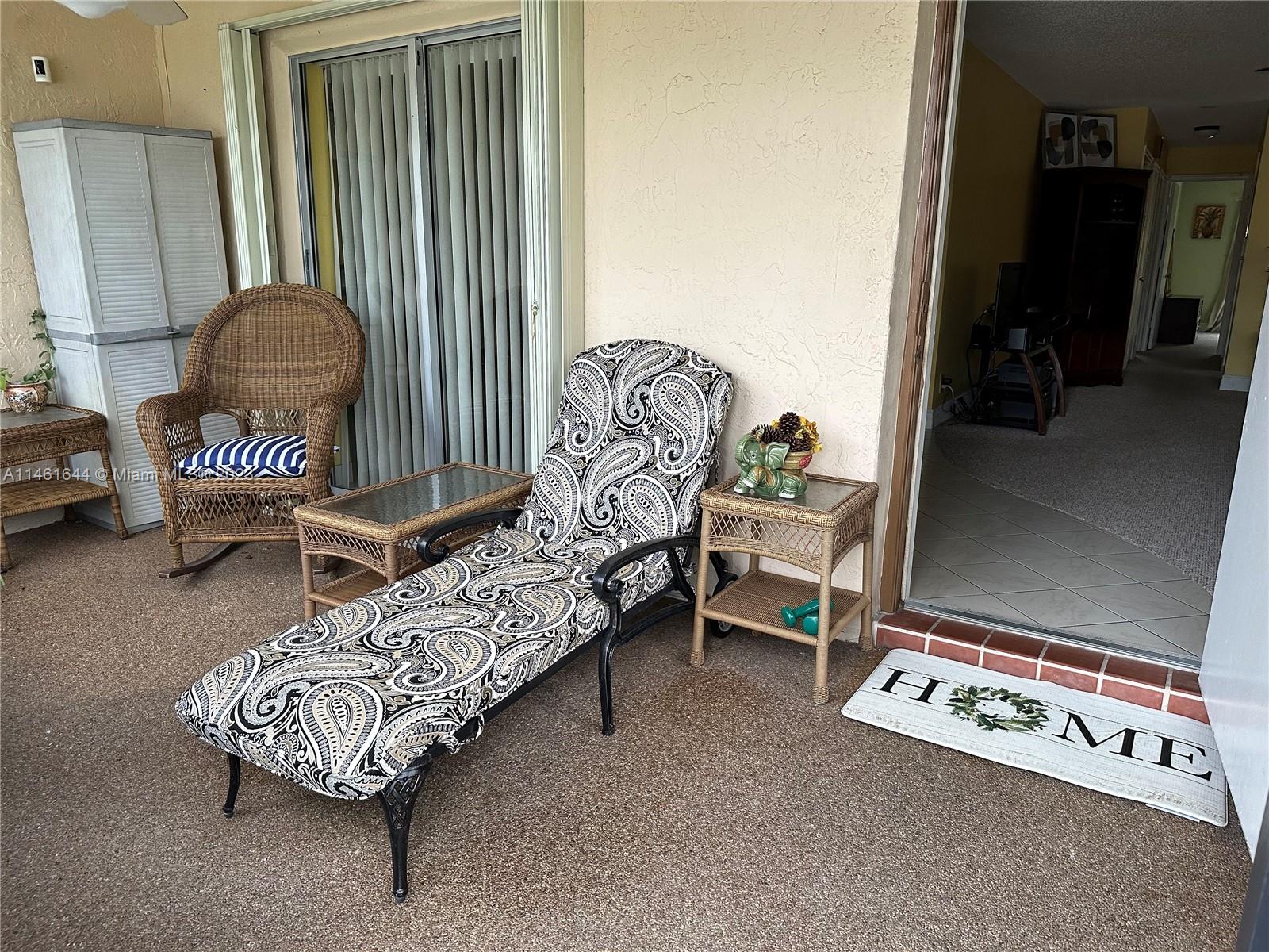 14711 Edna Way Delray Beach, FL 33484 - Photo 16 of 23 a living room with furniture and a window