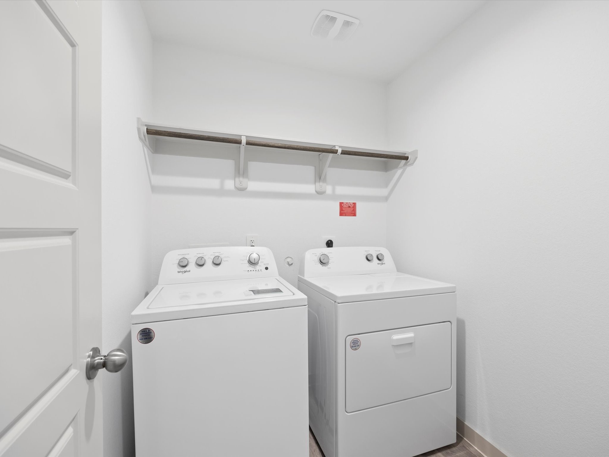 12733 Ermine Street Houston, TX 77047 - Photo 14 of 15 a utility room with dryer and washer