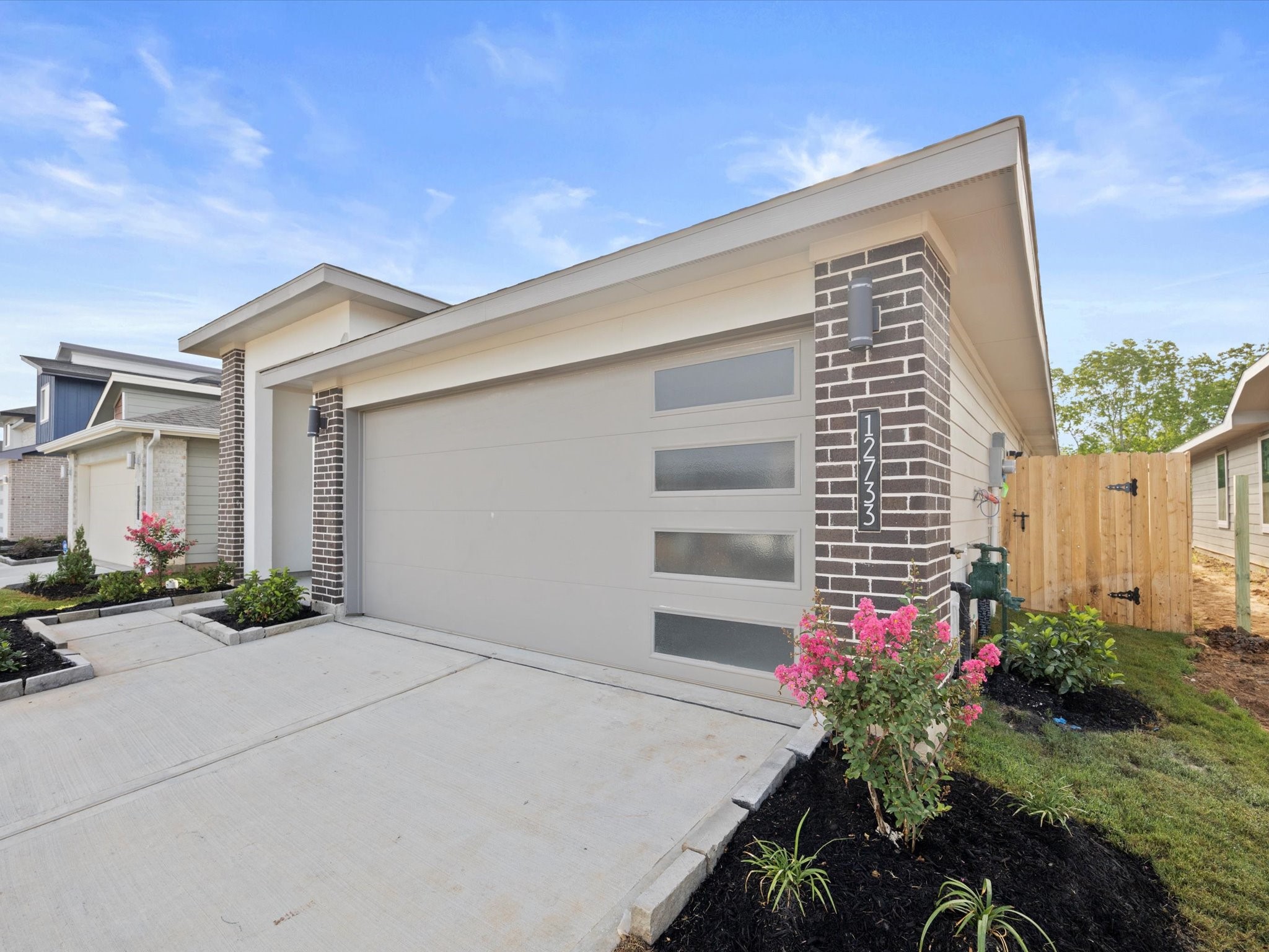 12733 Ermine Street Houston, TX 77047 - Photo 2 of 15 a house view with a outdoor space