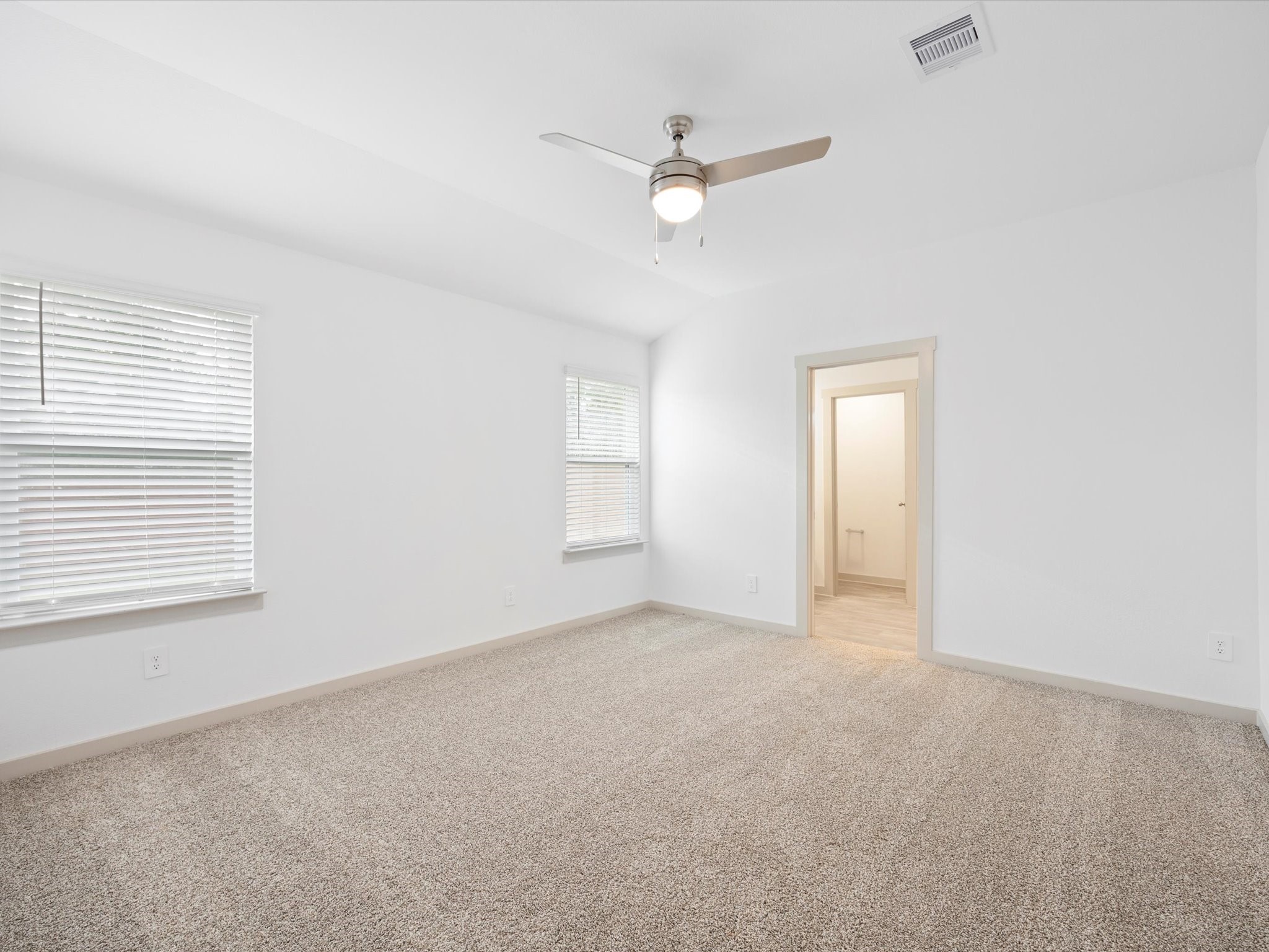 12733 Ermine Street Houston, TX 77047 - Photo 7 of 15 a view of an empty room with a window