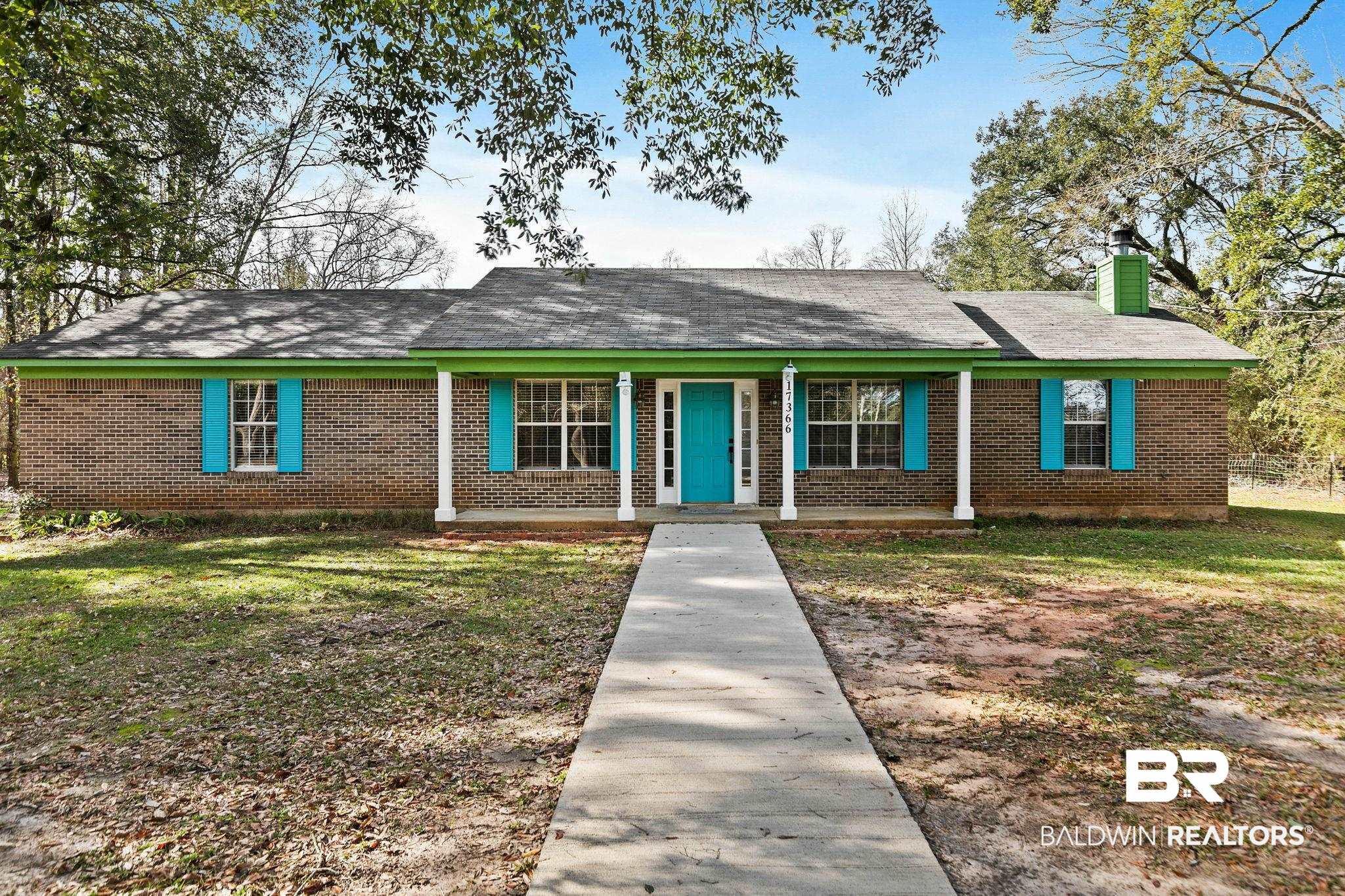 17366 Old Brady Road Bay Minette, AL 36507 - Photo 1 of 43 Single story home featuring a porch, brick siding, a chimney, and a shingled roof