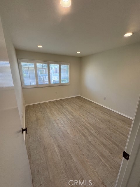 4455 West Coast Highway, Unit 23 Newport Beach, CA 92663 - Photo 11 of 30 an empty room with windows
