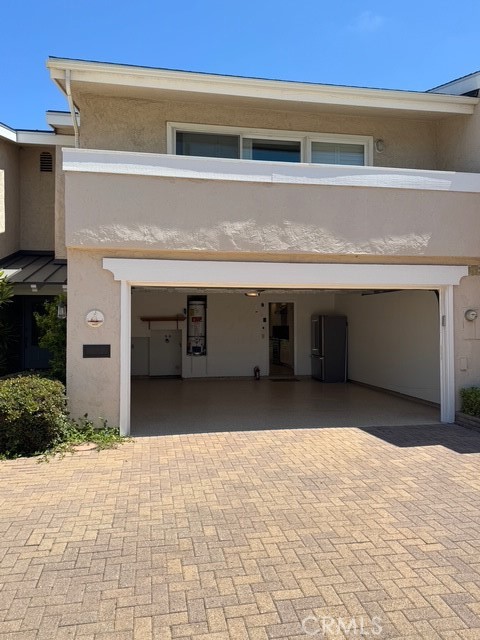 4455 West Coast Highway, Unit 23 Newport Beach, CA 92663 - Photo 22 of 30 a view of outdoor space