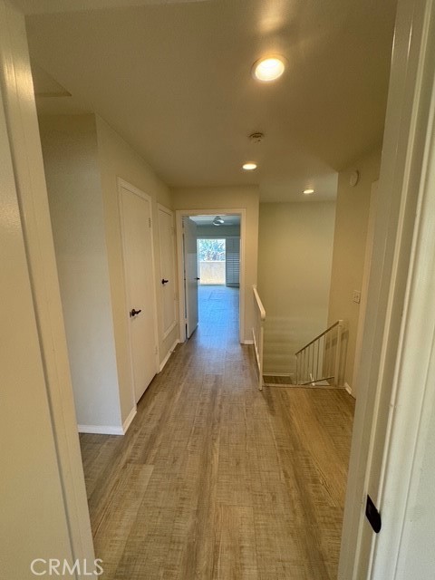 4455 West Coast Highway, Unit 23 Newport Beach, CA 92663 - Photo 9 of 30 a view of entryway with wooden floor