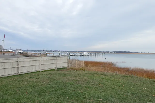a view of a lake with a big yard