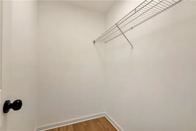 a view of a room with racks on the wall