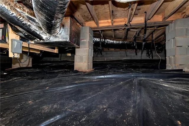 a view of a garage with wooden wall