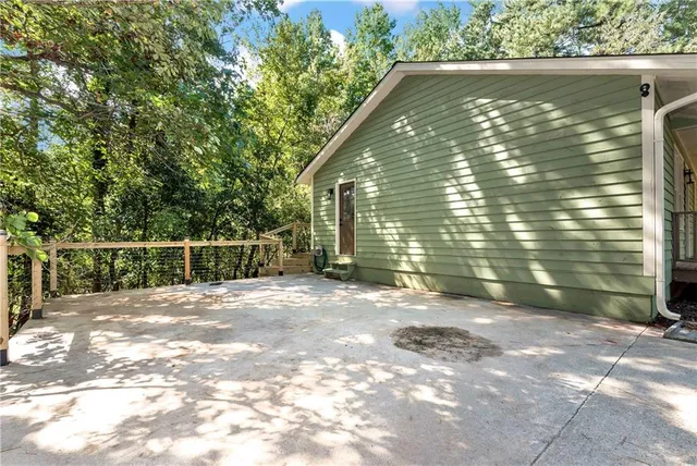 a view of backyard with green space