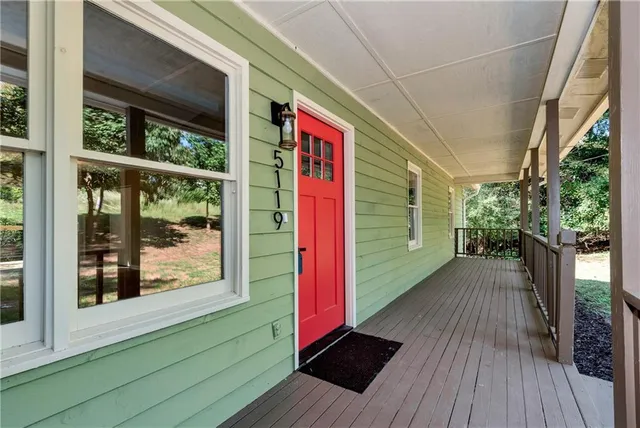 a view of a house with a deck