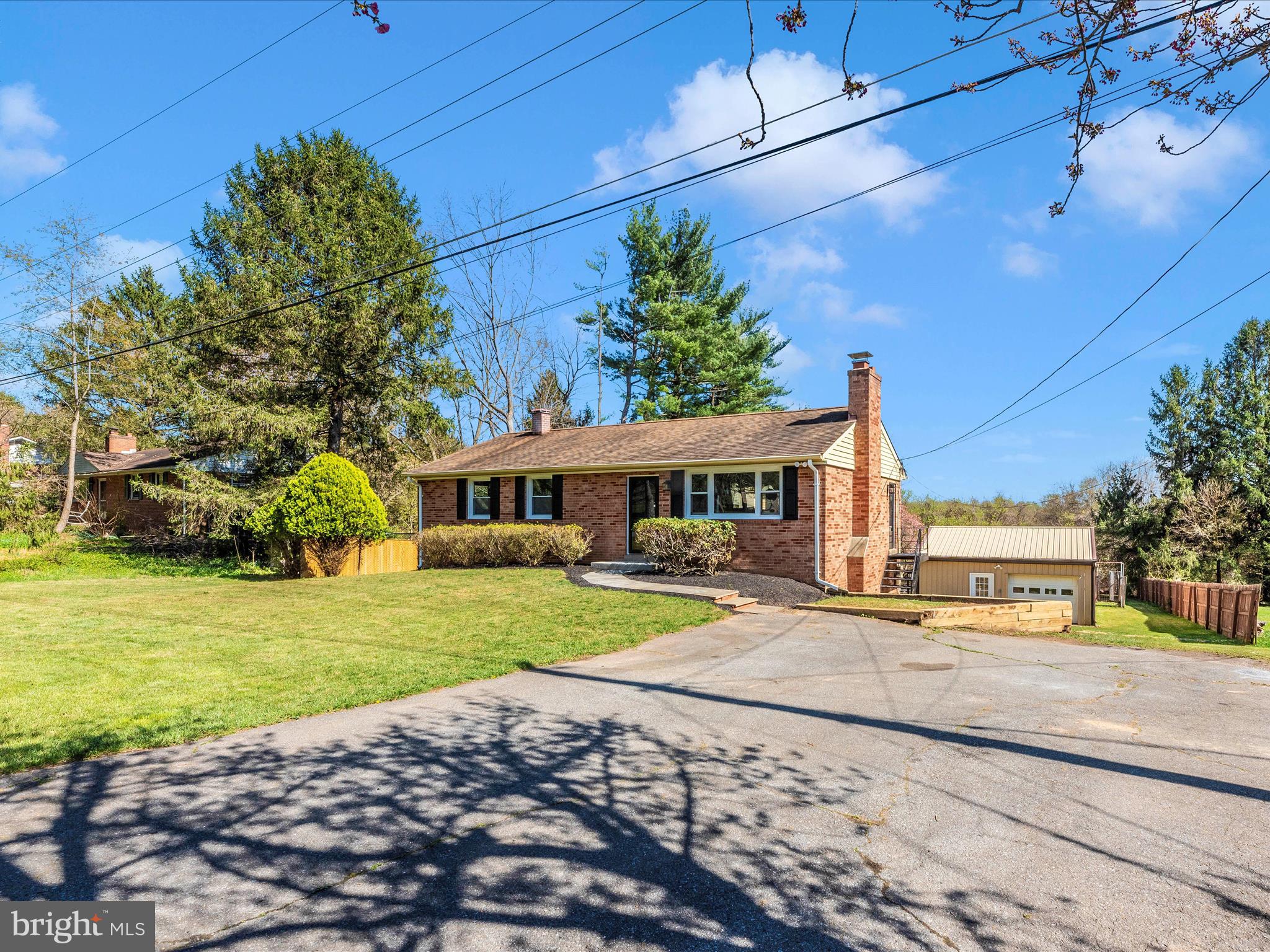 15224 Ganley Road Boyds, MD 20841 - Photo 51 of 62 a front view of a house with a yard