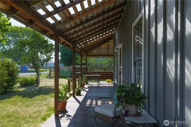 a patio with yard table and chairs