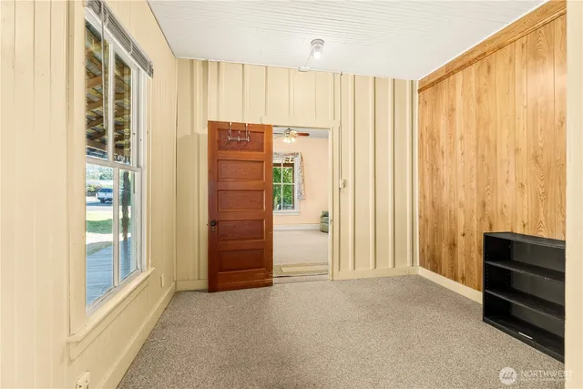 a view of an empty room and window