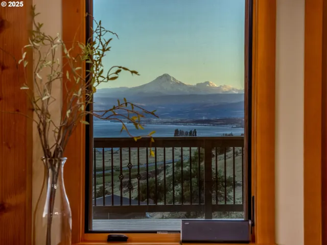 a view of balcony with wooden floor
