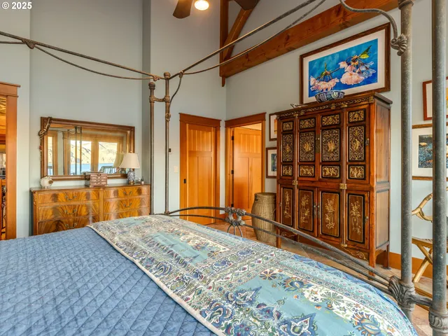a bathroom with double vanity and a shower