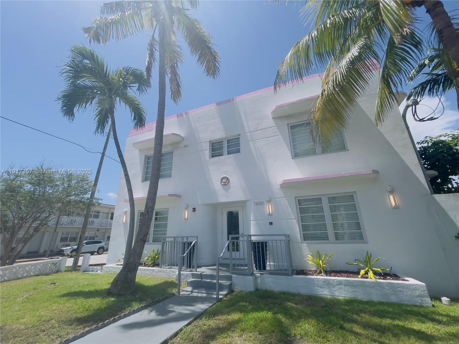 7600 Harding Avenue, Unit 705 Miami Beach, FL 33141 - Photo 3 of 10 a front view of a house with swimming pool