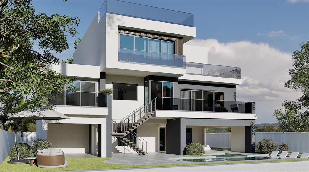 512 173rd Avenue North Redington Beach, FL 33708 - Photo 7 of 17 a front view of a house with garage