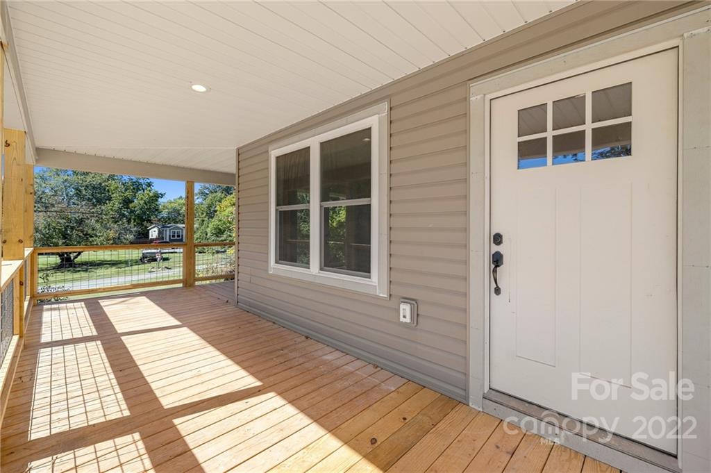 8 Split Rail Drive Asheville, NC 28806 - Photo 3 of 24 a view of a balcony with wooden floor